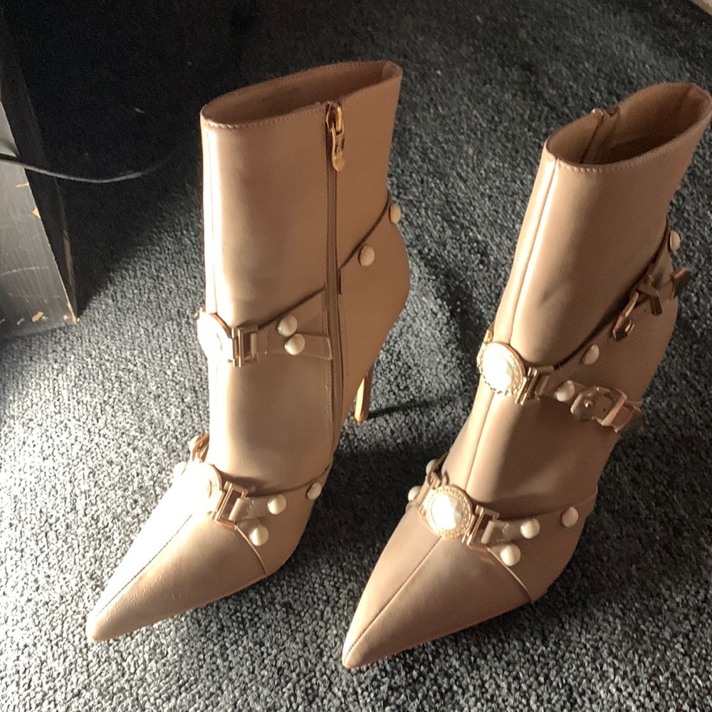 Tan boots with white pearls